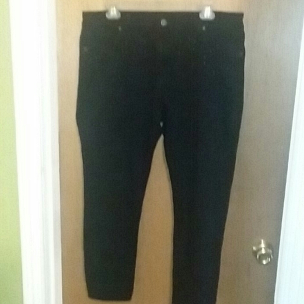 24 pair of black d.j. jeans